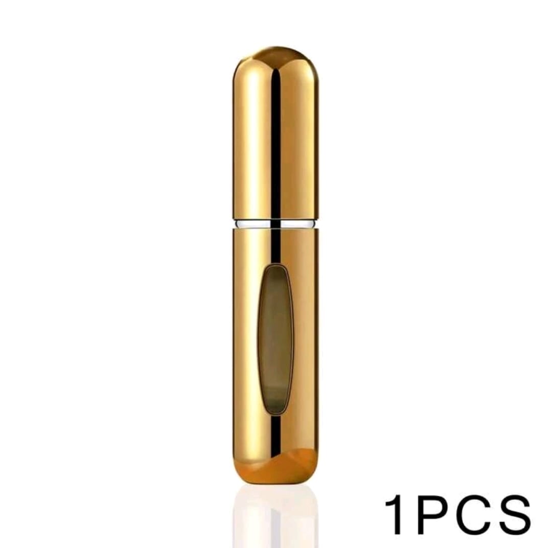 Botella con atomizador para perfume